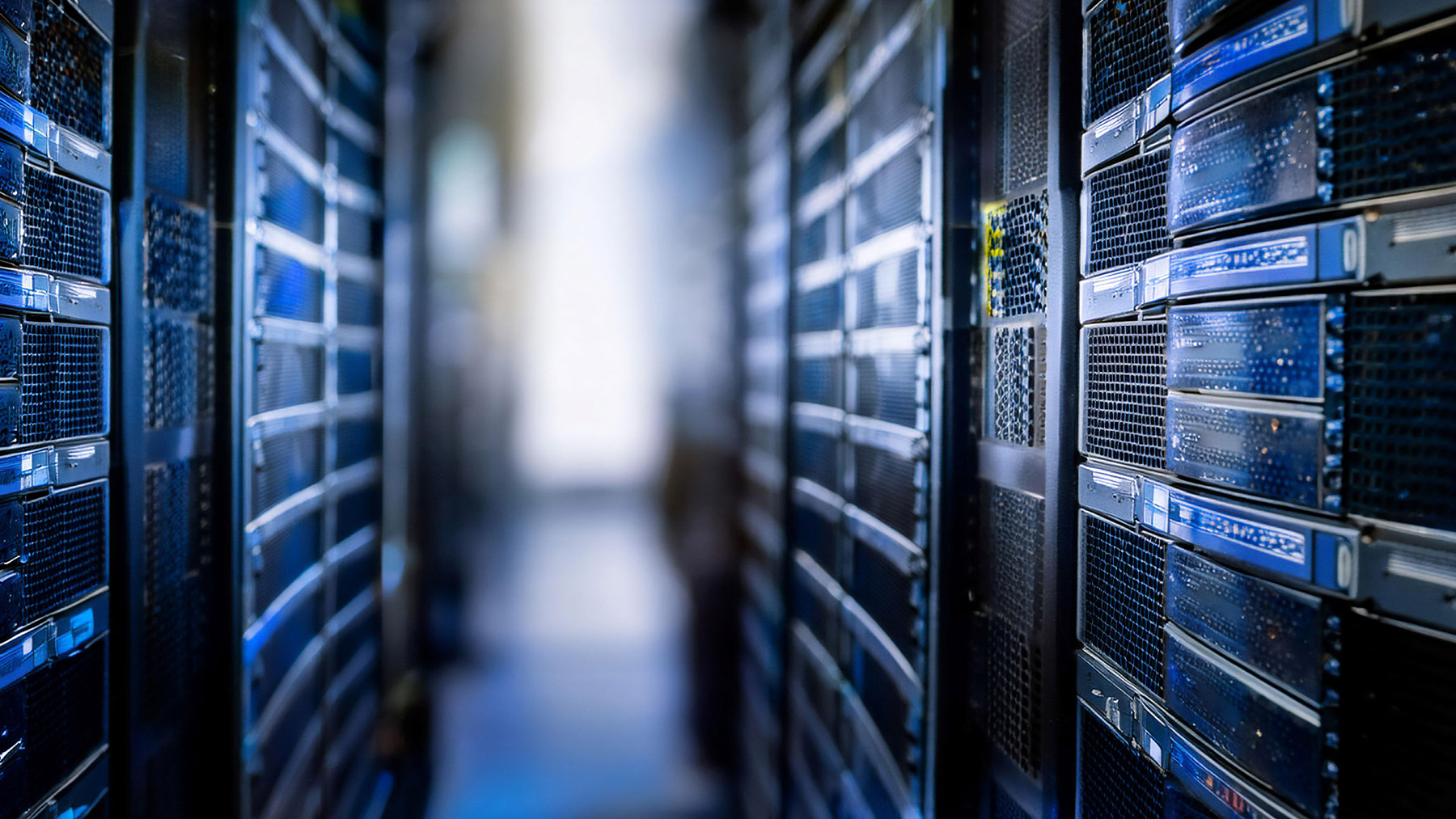 Rows of servers inside a data centre representing global investment in AI computing infrastructure.