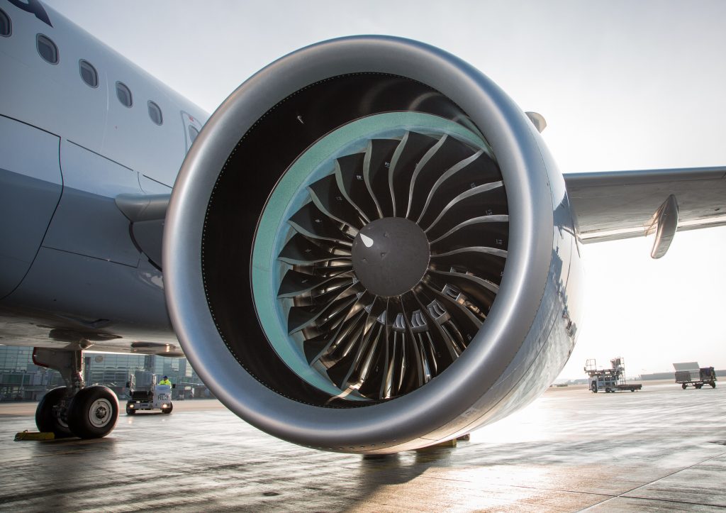 Close-up of a commercial aircraft jet engine illustrating the aerospace engineering sector in which Senior plc operates.
