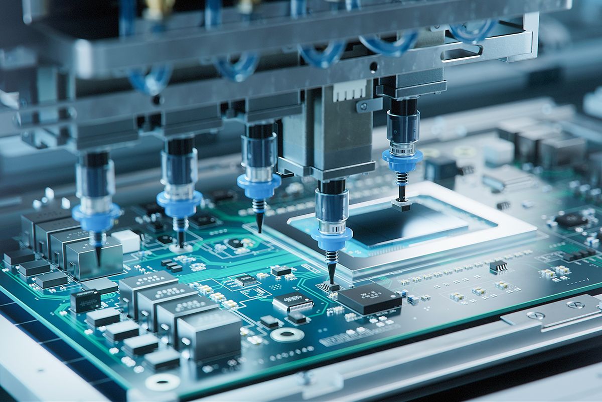 Automated electronic manufacturing equipment assembling circuit boards.
