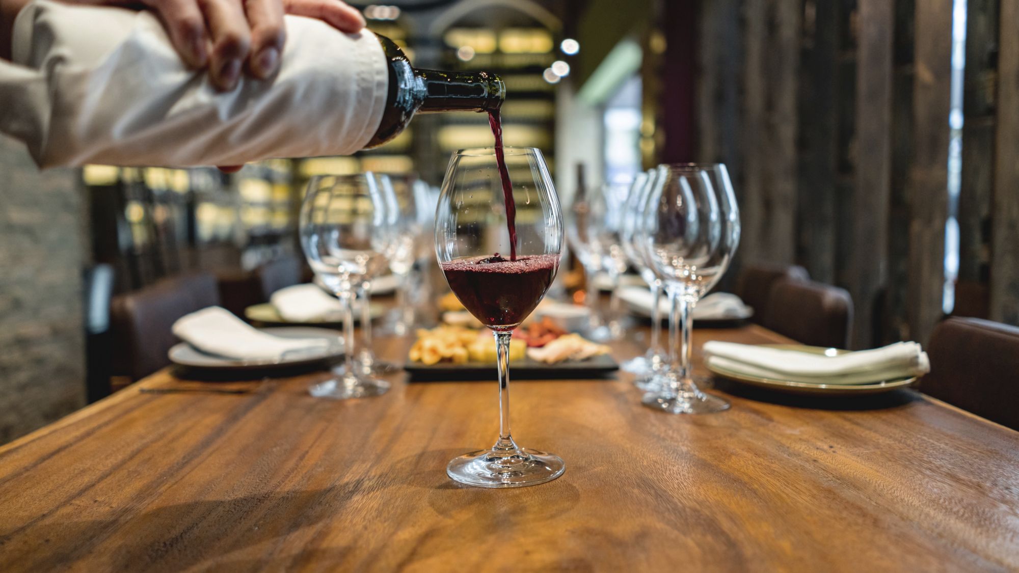 Wine glasses arranged on a table