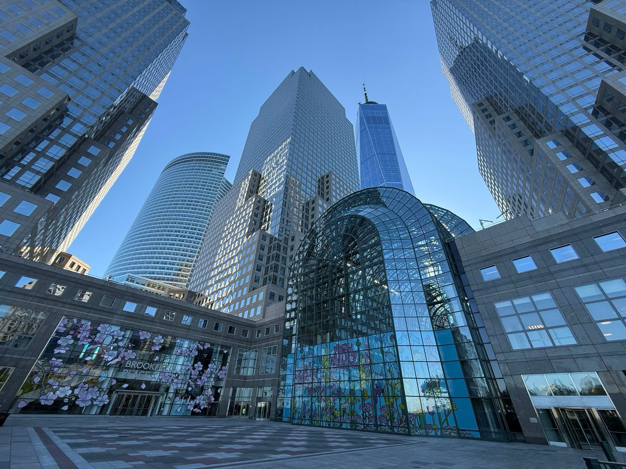 Glass skyscrapers at Brookfield Place in Lower Manhattan, New York, illustrating US corporate finance.